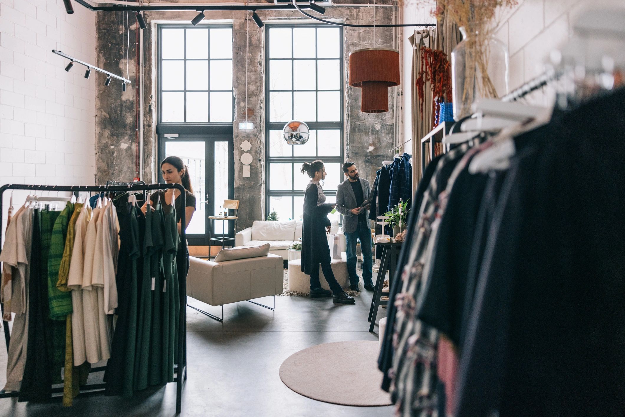 Customers shopping in a modern boutique