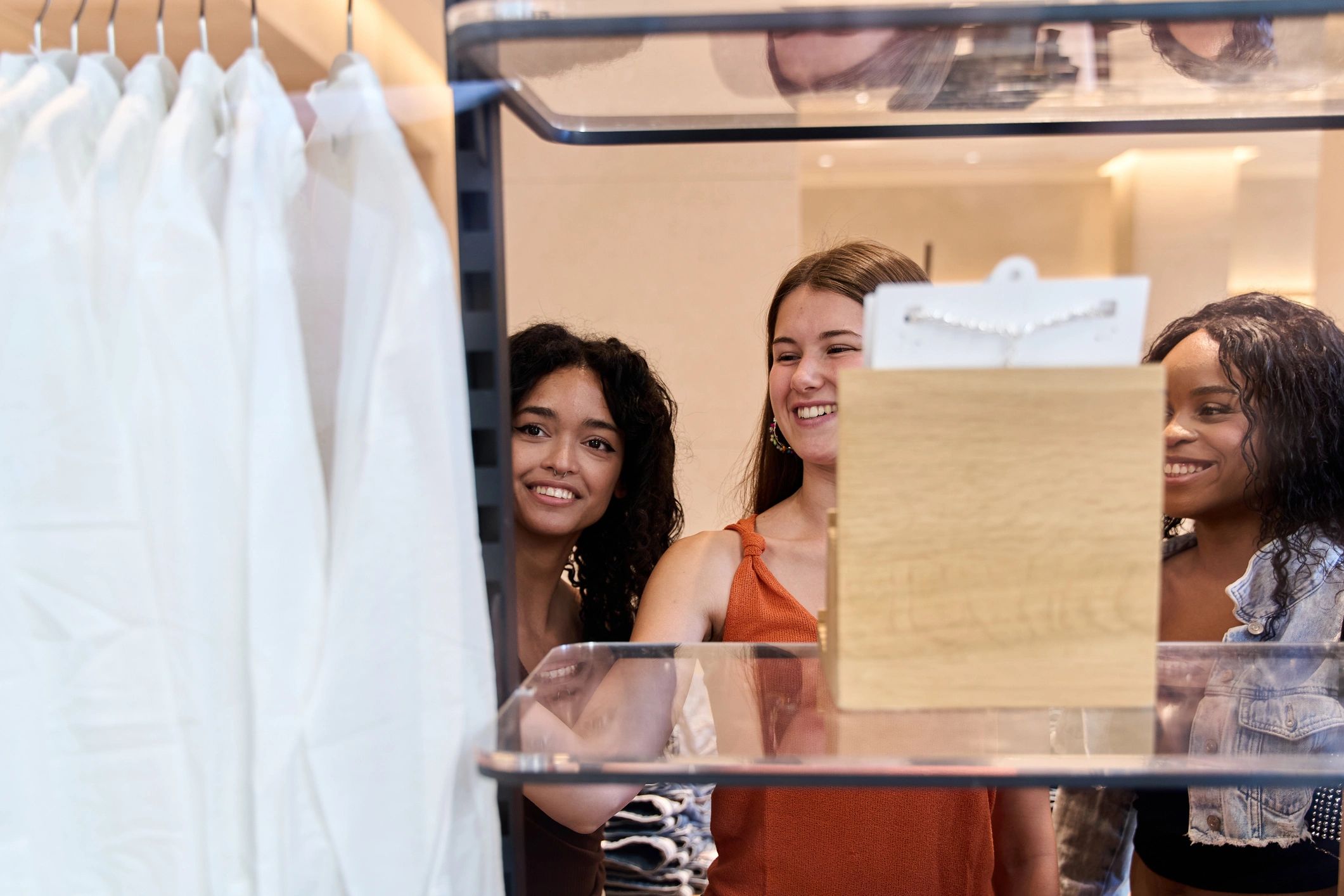 Women browsing jewelry in a fashion store