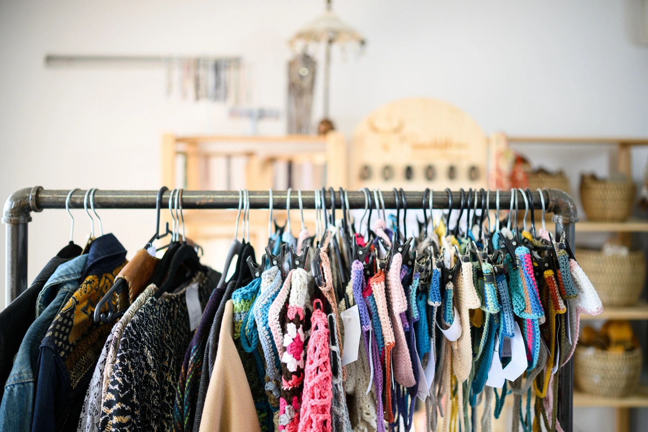 Boutique interior with clothing rack and natural decor